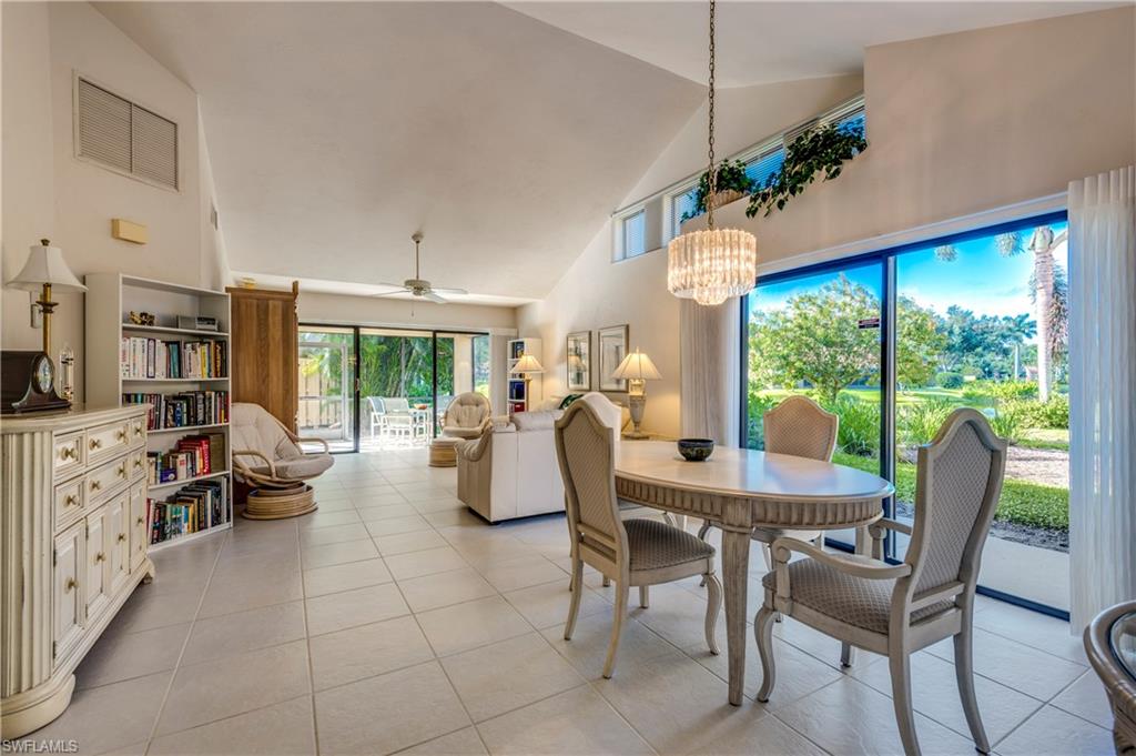 867 Reef Point Circle Naples, FL 34108 - Photo 6 of 32 Formal dining room offers lake view