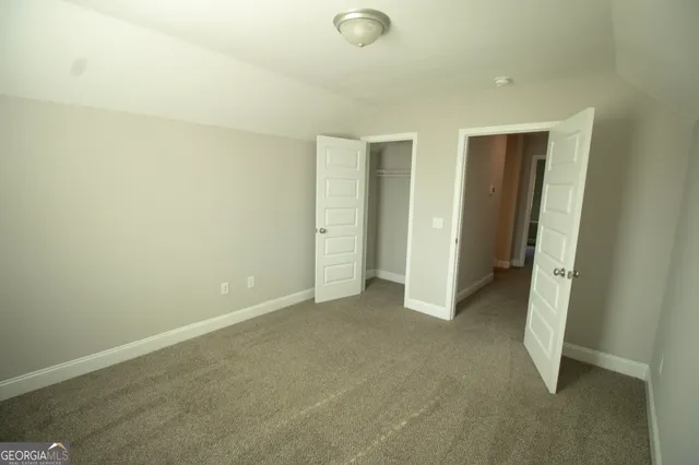 an empty room with closet