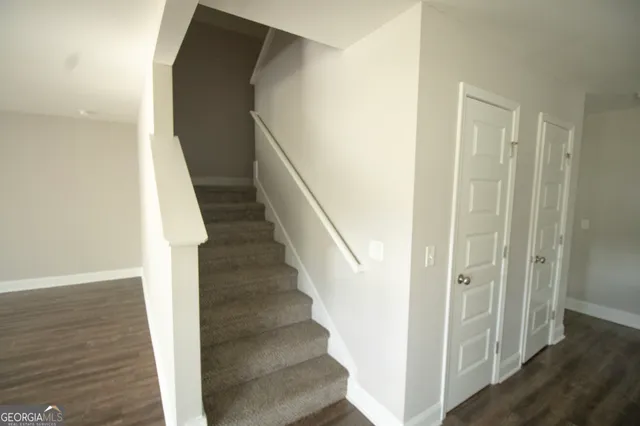 a view of entryway with wooden floor