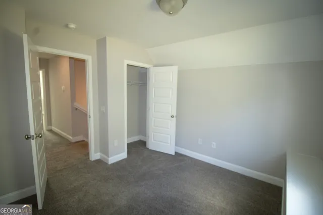 an empty room with a door