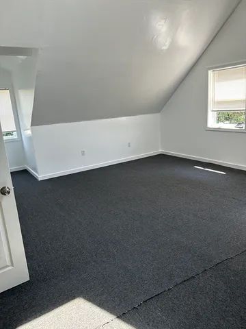 a close view of an empty room and a window