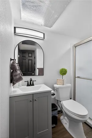 a view of hallway with wooden floor