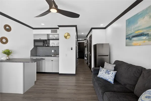 a living room with furniture and a window