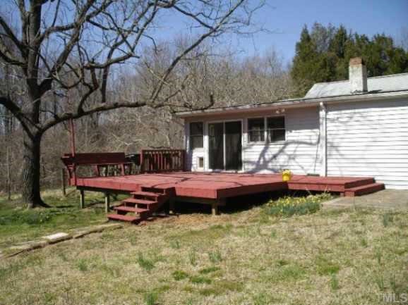 6710 Hebron Church Road Mebane, NC 27302 - Photo 3 of 12 Back Deck. Sitting on back deck, you have lovely view across pasture to lake.