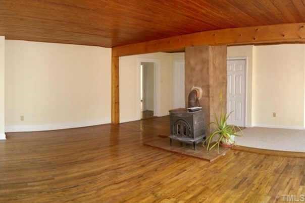 6710 Hebron Church Road Mebane, NC 27302 - Photo 5 of 12 Living Room with wood-burning stove