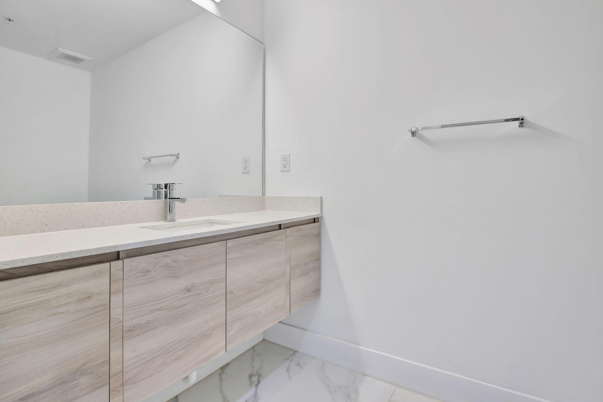 4100 Southwest 64th Avenue, Unit 315 Davie, FL 33314 - Photo 7 of 16 a bathroom with a sink and vanity