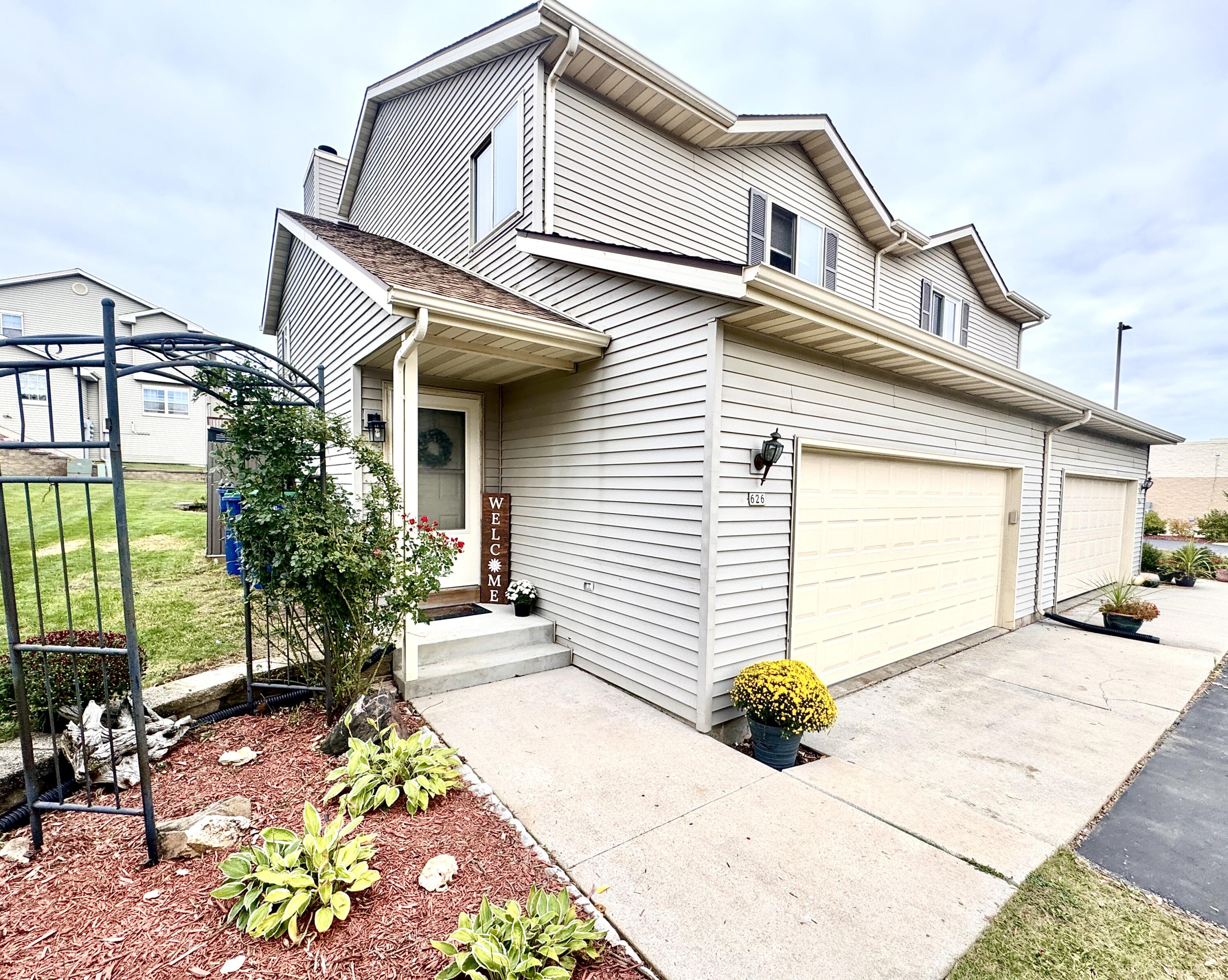 Nicely landscaped areas throughout the yard, very welcoming as you enter.