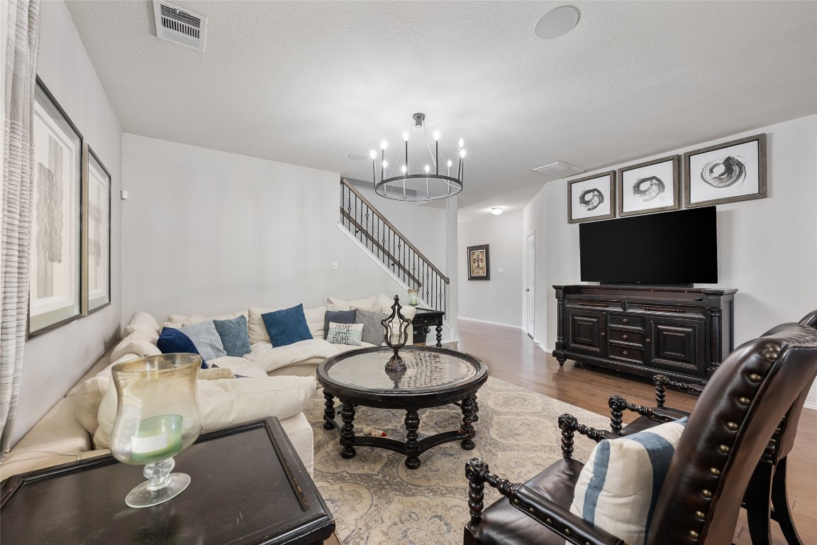 808 Bonnet Boulevard Georgetown, TX 78628 - Photo 12 of 40 a living room with furniture and a flat screen tv