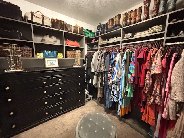 808 Bonnet Boulevard Georgetown, TX 78628 - Photo 35 of 40 a view of walk in closet with clothes and shoes