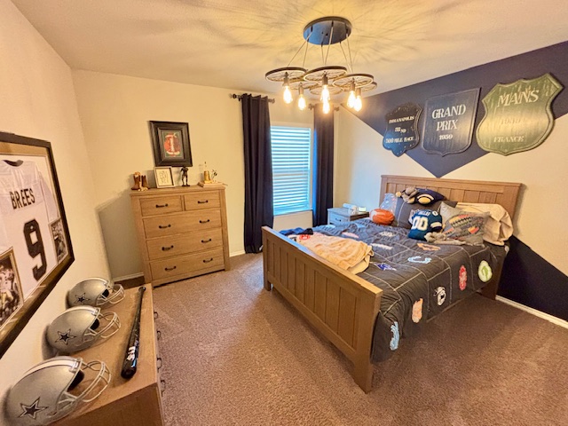 808 Bonnet Boulevard Georgetown, TX 78628 - Photo 40 of 40 a living room with furniture and a chandelier