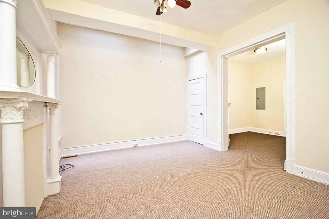 2443 Ontario Road Northwest Washington, DC 20009 - Photo 16 of 30 Living Room w skylight - Middle Unit #1