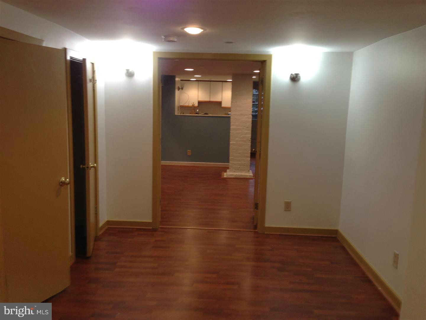 2443 Ontario Road Northwest Washington, DC 20009 - Photo 10 of 30 Bedroom to living area view