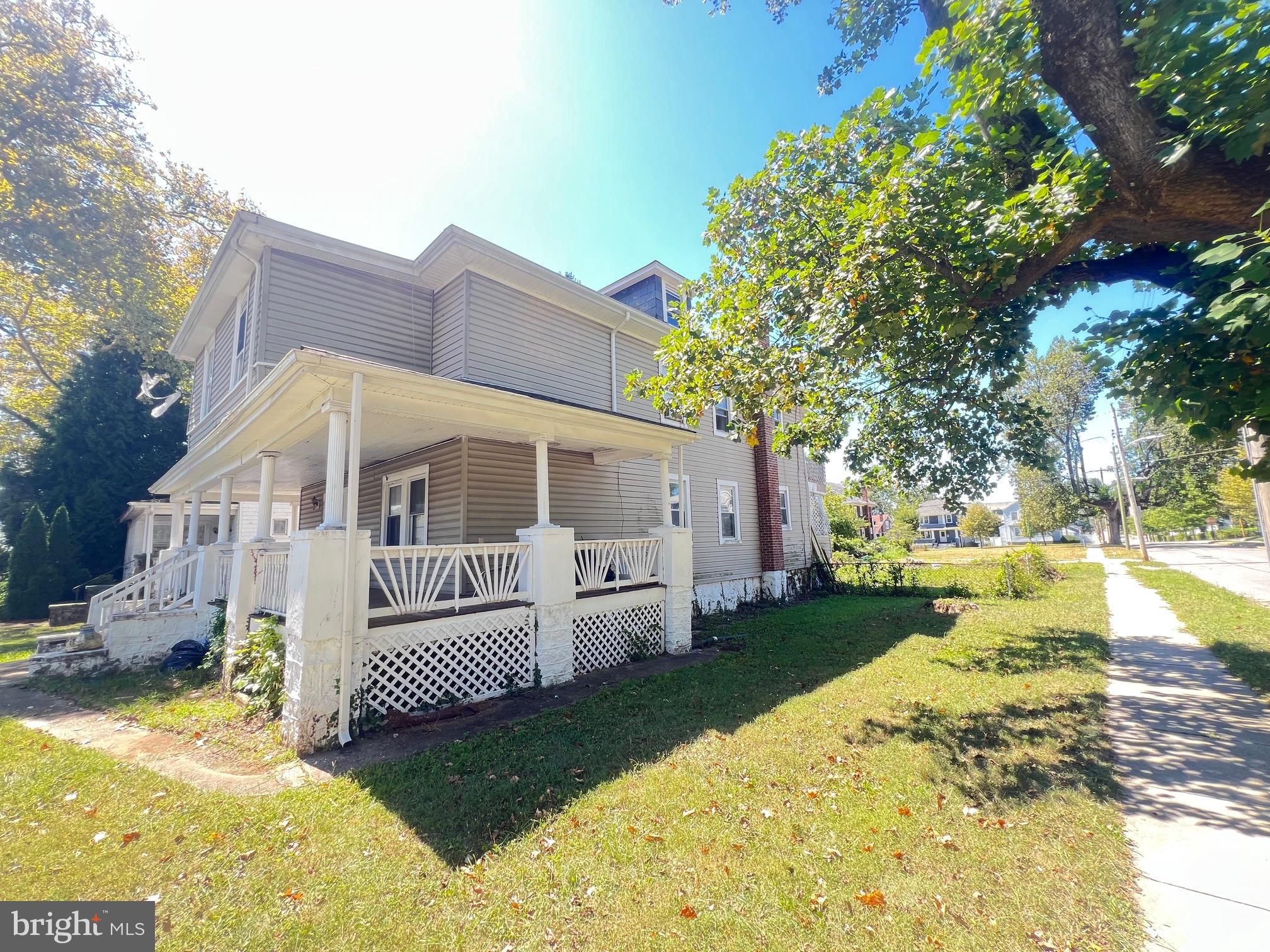 3716 Mohawk Avenue Baltimore, MD 21207 - Photo 2 of 4 a view of a house with a yard