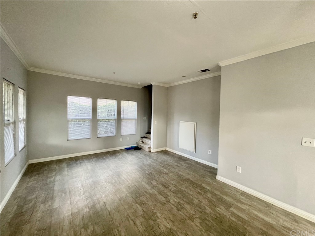 2840 Maxson Road El Monte, CA 91732 - Photo 2 of 14 an empty room with wooden floor and windows