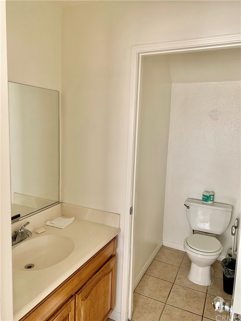 2840 Maxson Road El Monte, CA 91732 - Photo 3 of 14 a kitchen with a stove a sink and a refrigerator