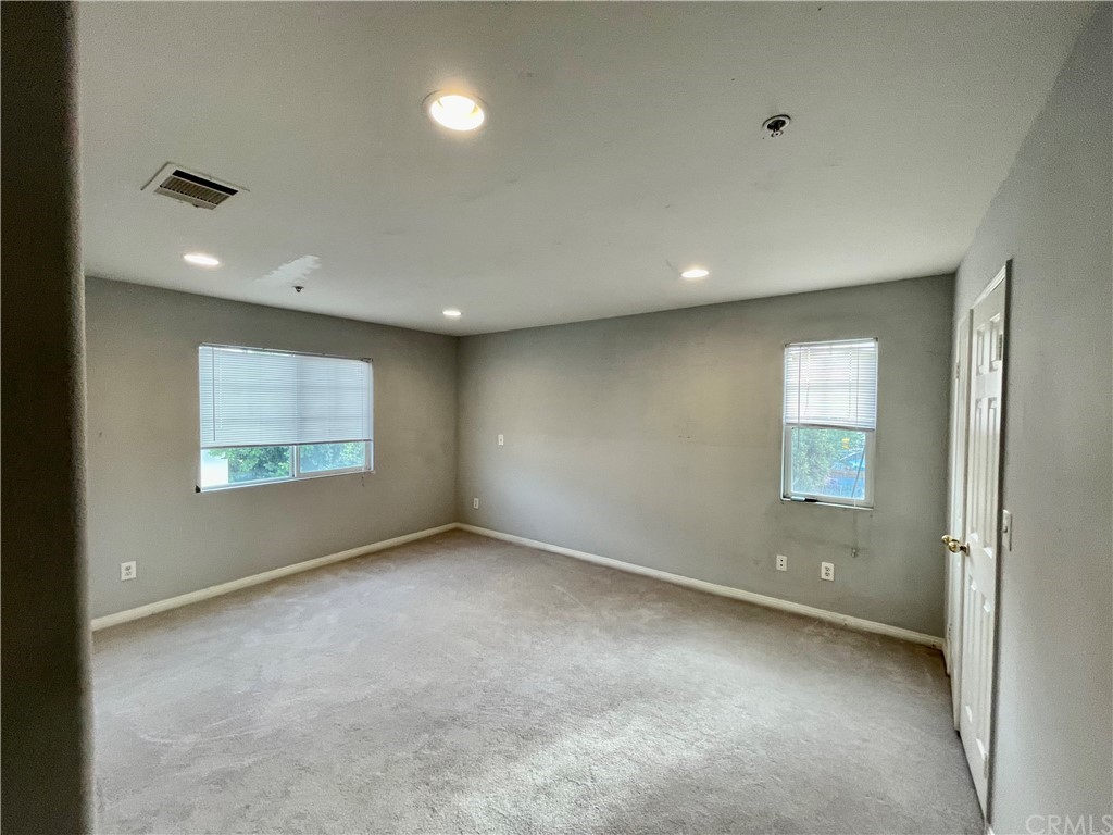 2840 Maxson Road El Monte, CA 91732 - Photo 10 of 14 a spacious bathroom with a sink toilet and mirror