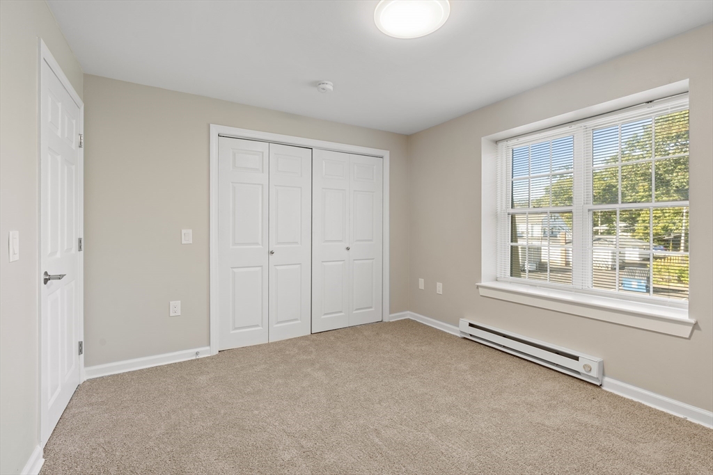 2 Ocean Avenue, Unit 3H Gloucester, MA 01930 - Photo 13 of 28 a view of an empty room with a window