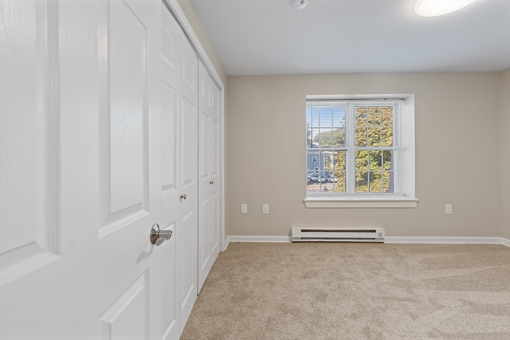 2 Ocean Avenue, Unit 3H Gloucester, MA 01930 - Photo 14 of 28 an empty room with windows