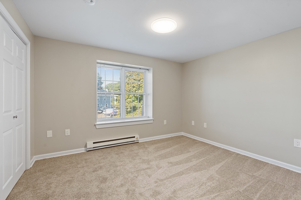 2 Ocean Avenue, Unit 3H Gloucester, MA 01930 - Photo 15 of 28 an empty room with windows