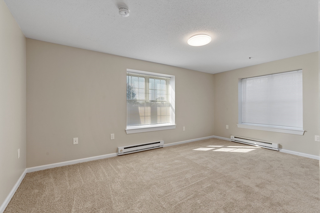 2 Ocean Avenue, Unit 3H Gloucester, MA 01930 - Photo 18 of 28 an empty room with windows