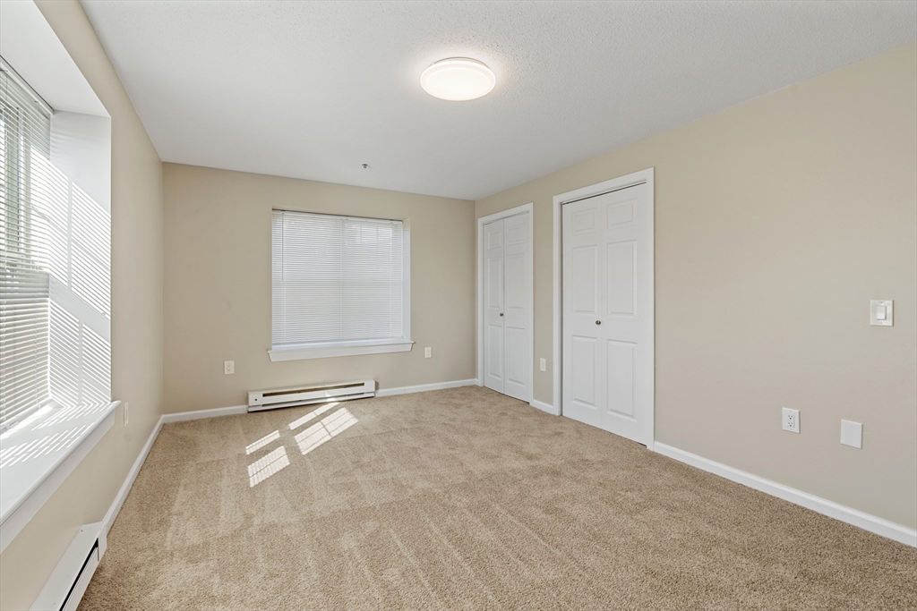 2 Ocean Avenue, Unit 3H Gloucester, MA 01930 - Photo 19 of 28 a view of an empty room with a window