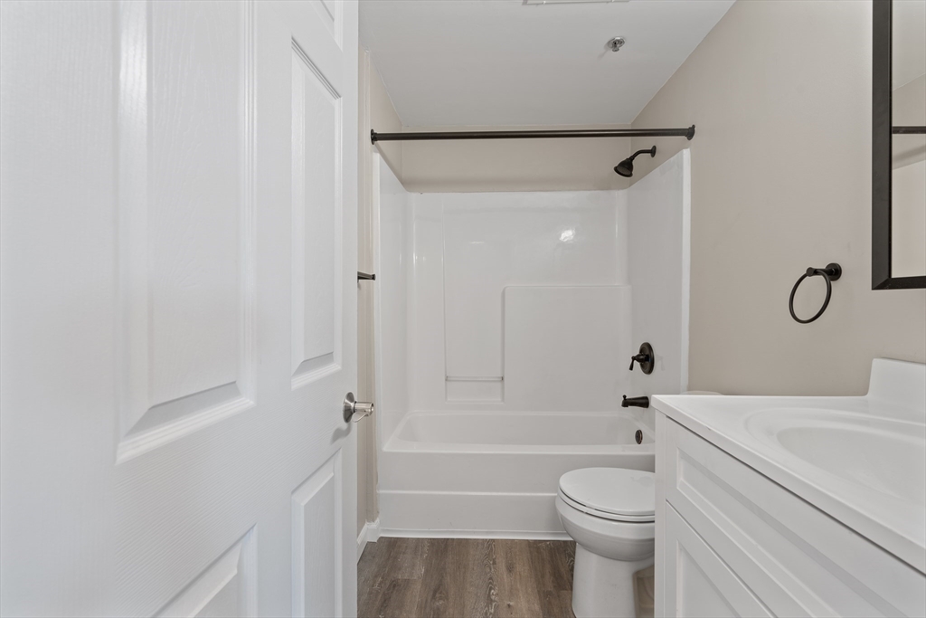 2 Ocean Avenue, Unit 3H Gloucester, MA 01930 - Photo 22 of 28 a bathroom with a toilet and a shower