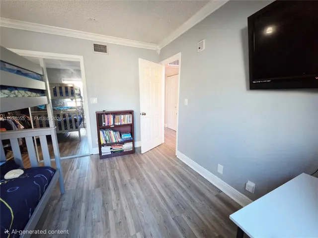 a view of livingroom with furniture and wooden floor