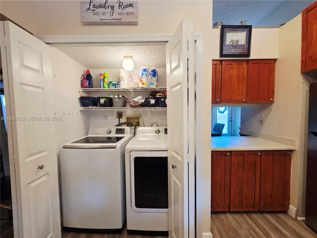 a storage room with washer and dryer