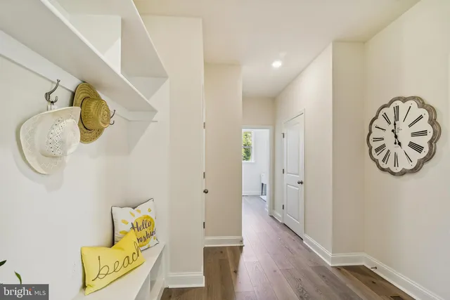 a view of entryway with wooden floor