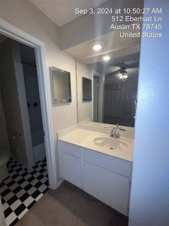 512 Eberhart Lane, Unit 103 Austin, TX 78745 - Photo 11 of 18 a bathroom with a bathtub and a sink