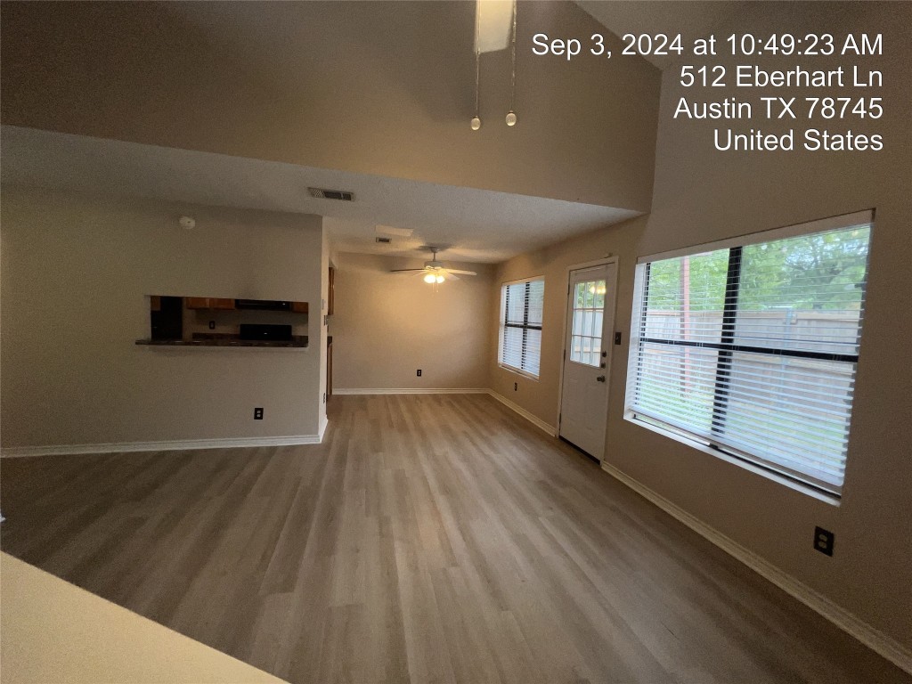 512 Eberhart Lane, Unit 103 Austin, TX 78745 - Photo 7 of 18 a view of a room with a large window