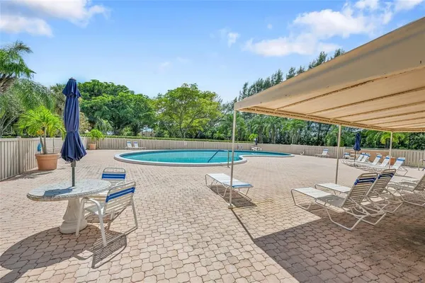 a table and chairs in the patio