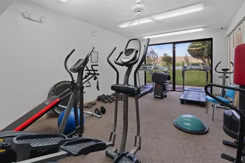 a view of a room with gym equipment