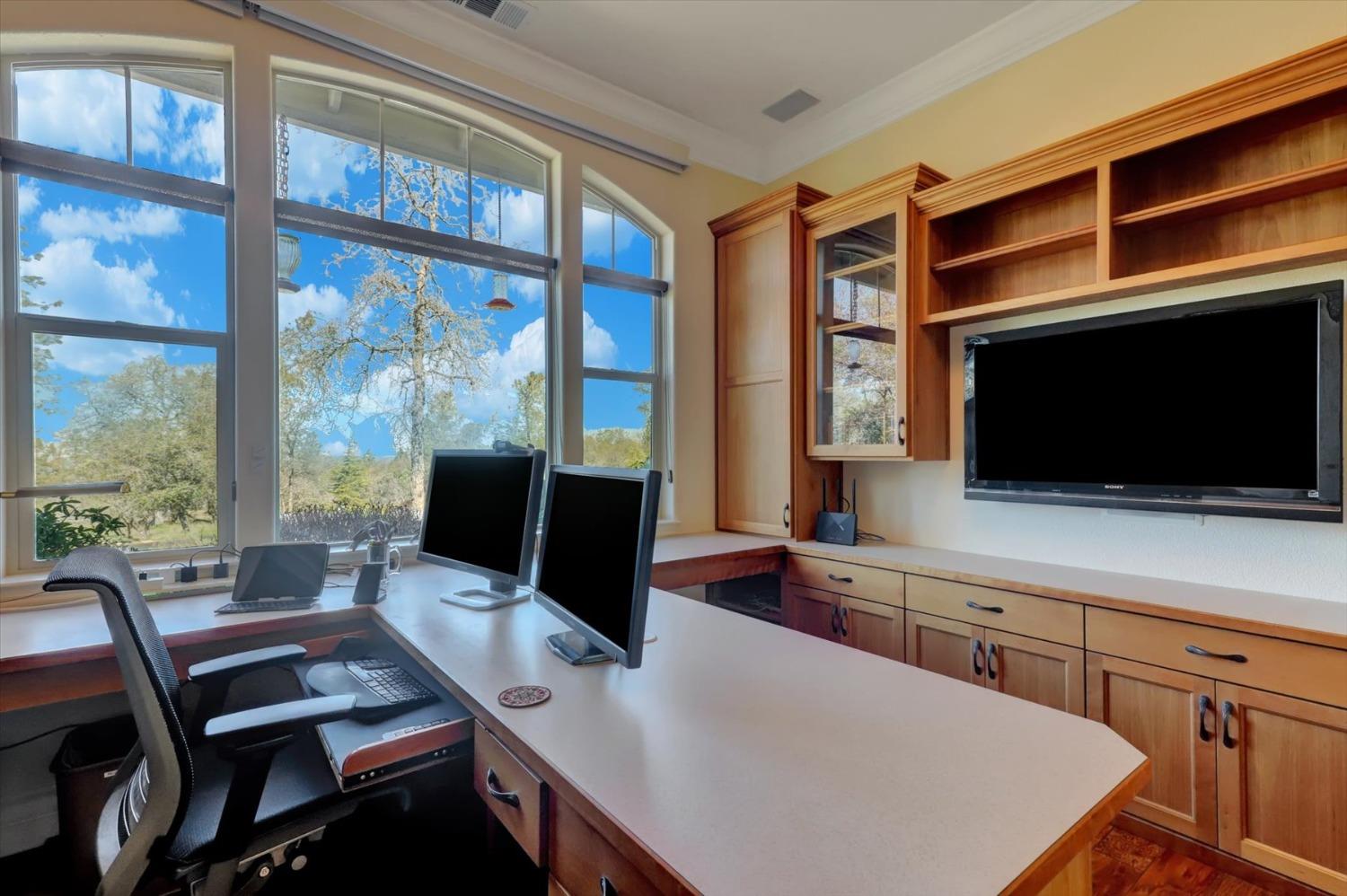 13197 American Ranch Court Grass Valley, CA 95949 - Photo 19 of 77 a view of a workspace with furniture