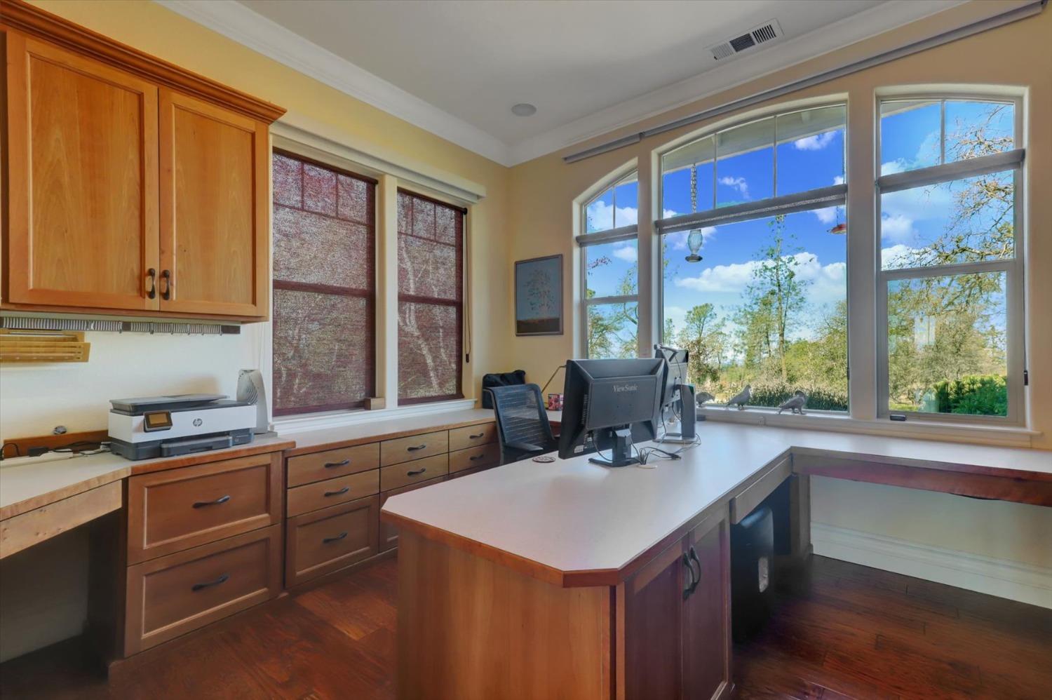13197 American Ranch Court Grass Valley, CA 95949 - Photo 20 of 77 a kitchen with a sink stove and cabinets