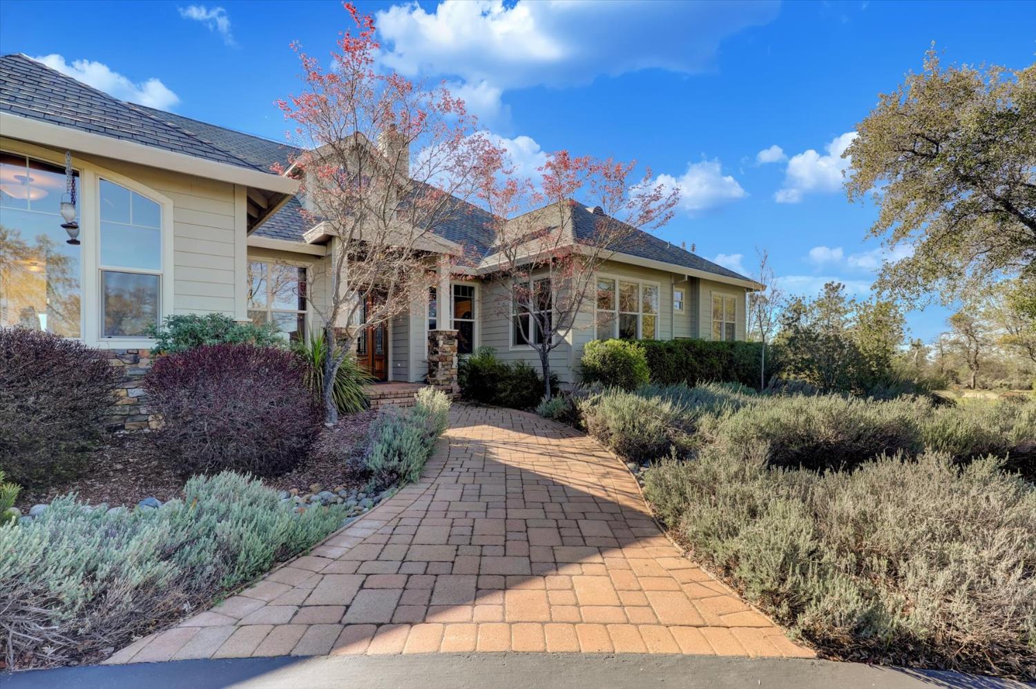 13197 American Ranch Court Grass Valley, CA 95949 - Photo 5 of 77 a view of a house with potted plants