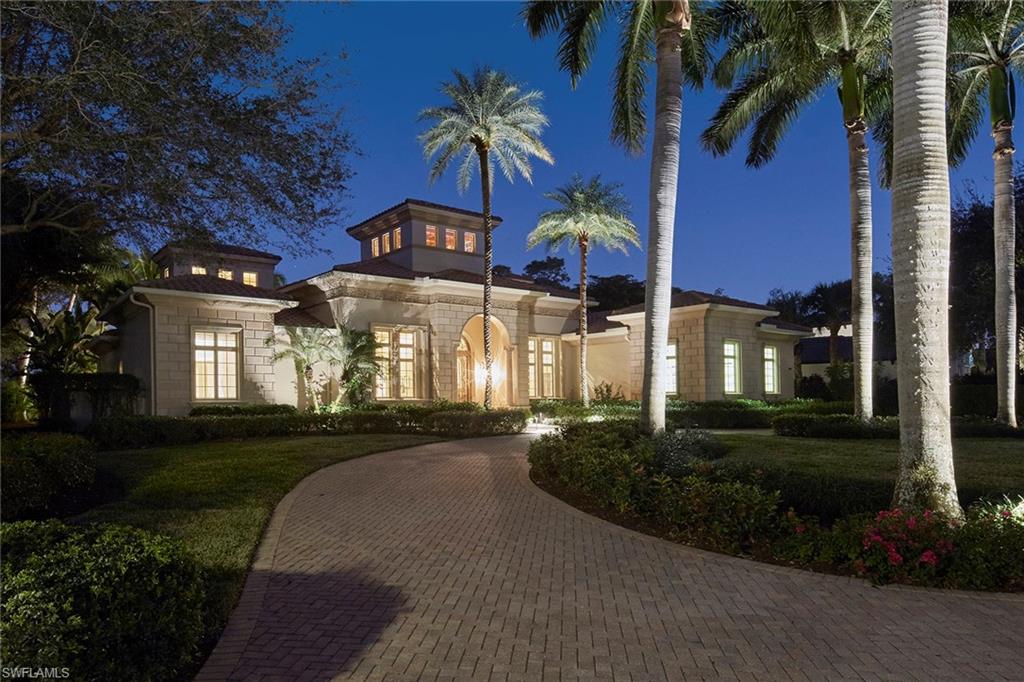 2944 Bellflower Lane Naples, FL 34105 - Photo 47 of 48 a front view of a house with a yard