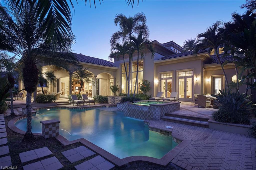 2944 Bellflower Lane Naples, FL 34105 - Photo 7 of 48 a view of a house with swimming pool and sitting area