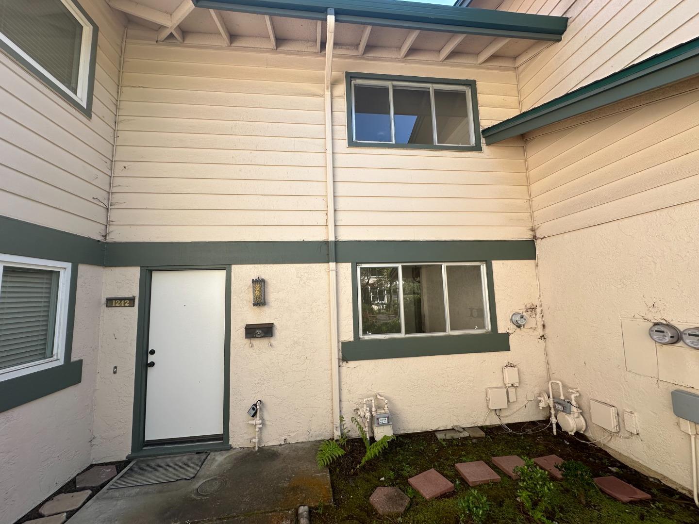 a front view of a house with a garage