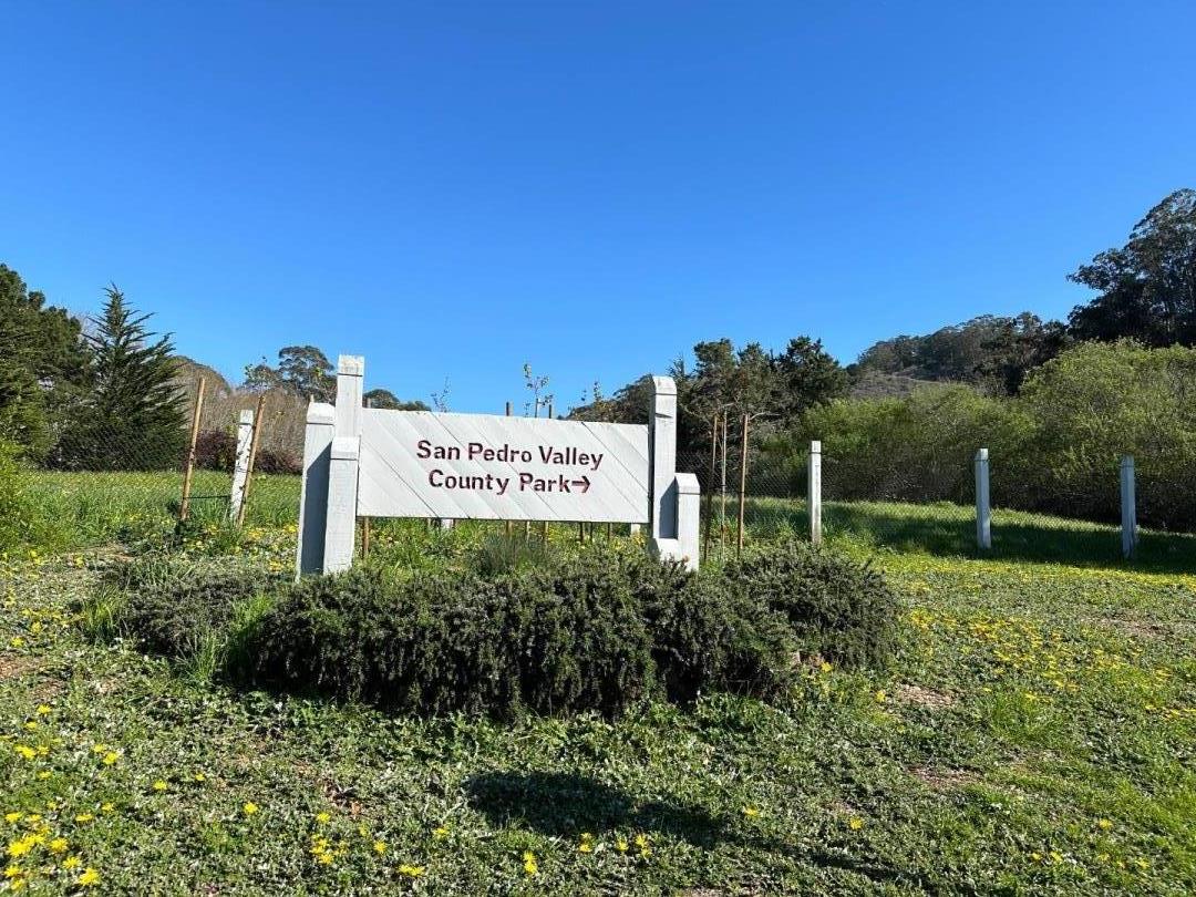 1242 Terra Nova Boulevard Pacifica, CA 94044 - Photo 25 of 26 a view of a sign in a garden