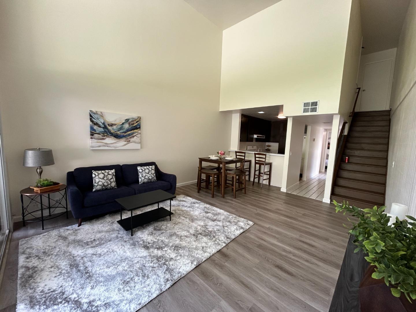 1242 Terra Nova Boulevard Pacifica, CA 94044 - Photo 4 of 26 a living room with furniture and wooden floor