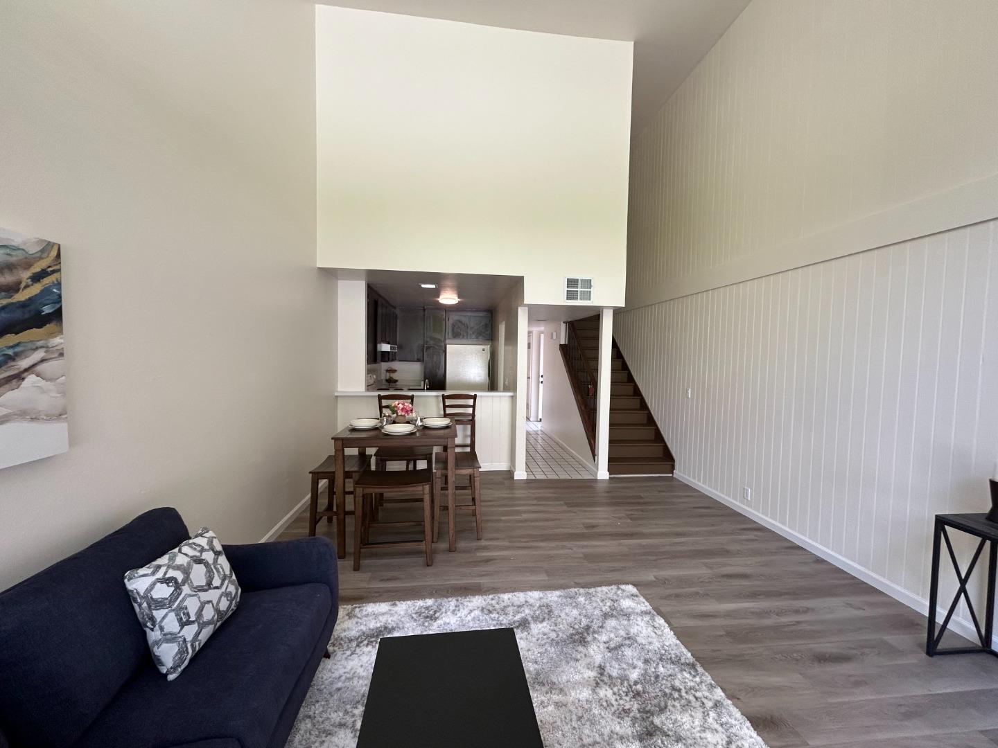 1242 Terra Nova Boulevard Pacifica, CA 94044 - Photo 5 of 26 a living room with furniture and a wooden floor