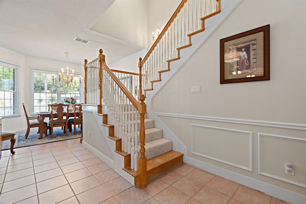 72 Crown Road Willow Park, TX 76087 - Photo 7 of 40 a view of entryway and hall with dining room
