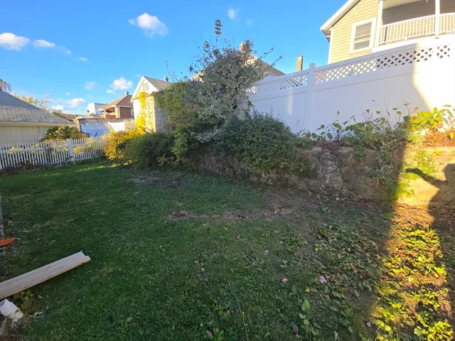 a view of a back yard of the house