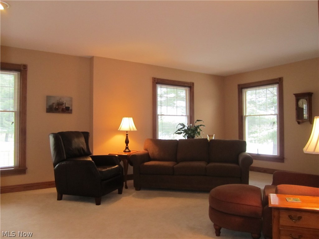 4834 Camp Road Rootstown, OH 44272 - Photo 7 of 22 Four over sized windows for the living room.