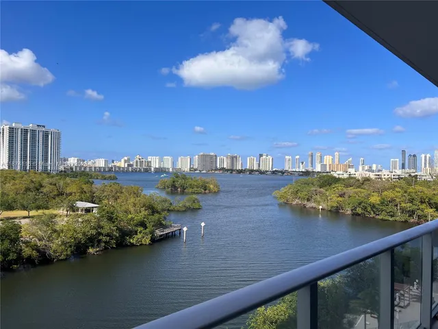 a view of a lake from a balcony
