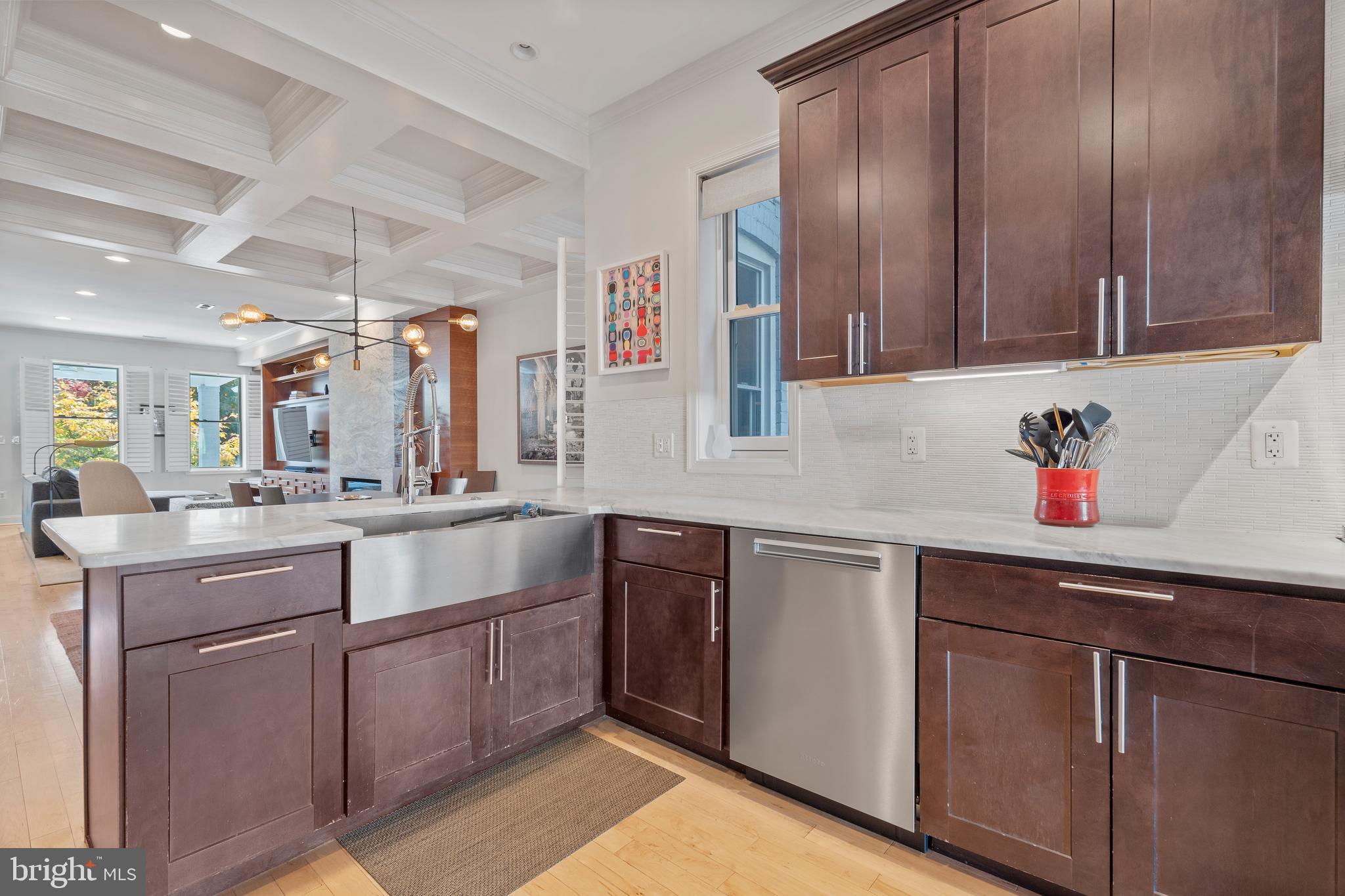 33 W Street Northwest, Unit 1 Washington, DC 20001 - Photo 15 of 36 a kitchen with a sink cabinets and window