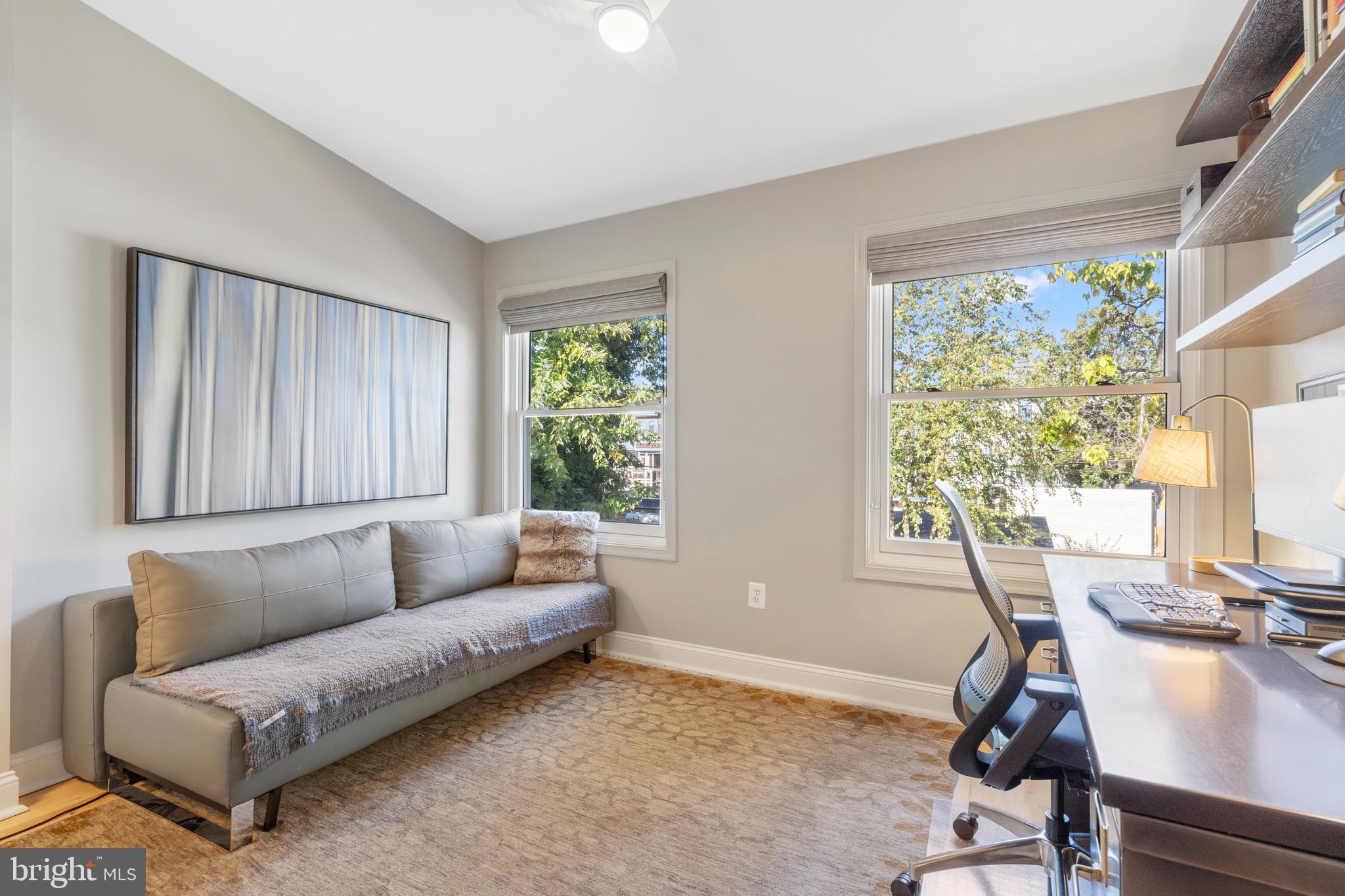 33 W Street Northwest, Unit 1 Washington, DC 20001 - Photo 21 of 36 a living room with furniture and a window