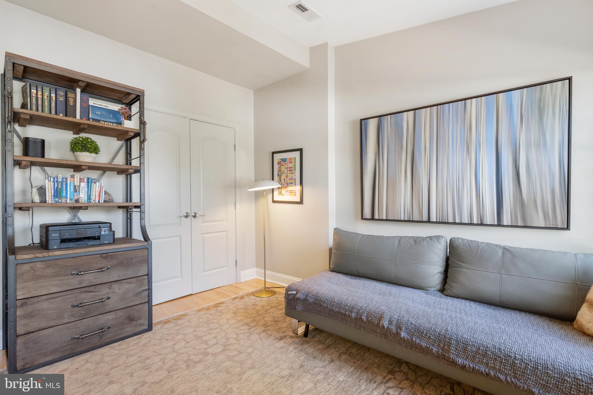 33 W Street Northwest, Unit 1 Washington, DC 20001 - Photo 23 of 36 a living room with furniture and a window