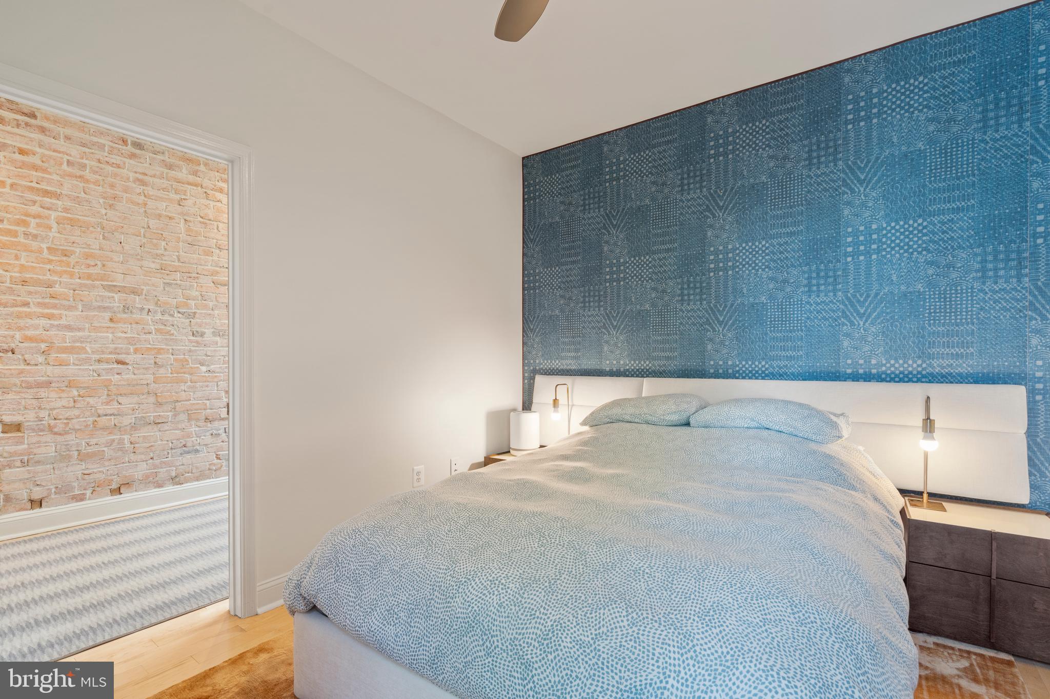 33 W Street Northwest, Unit 1 Washington, DC 20001 - Photo 27 of 36 a bedroom with a bed and a window